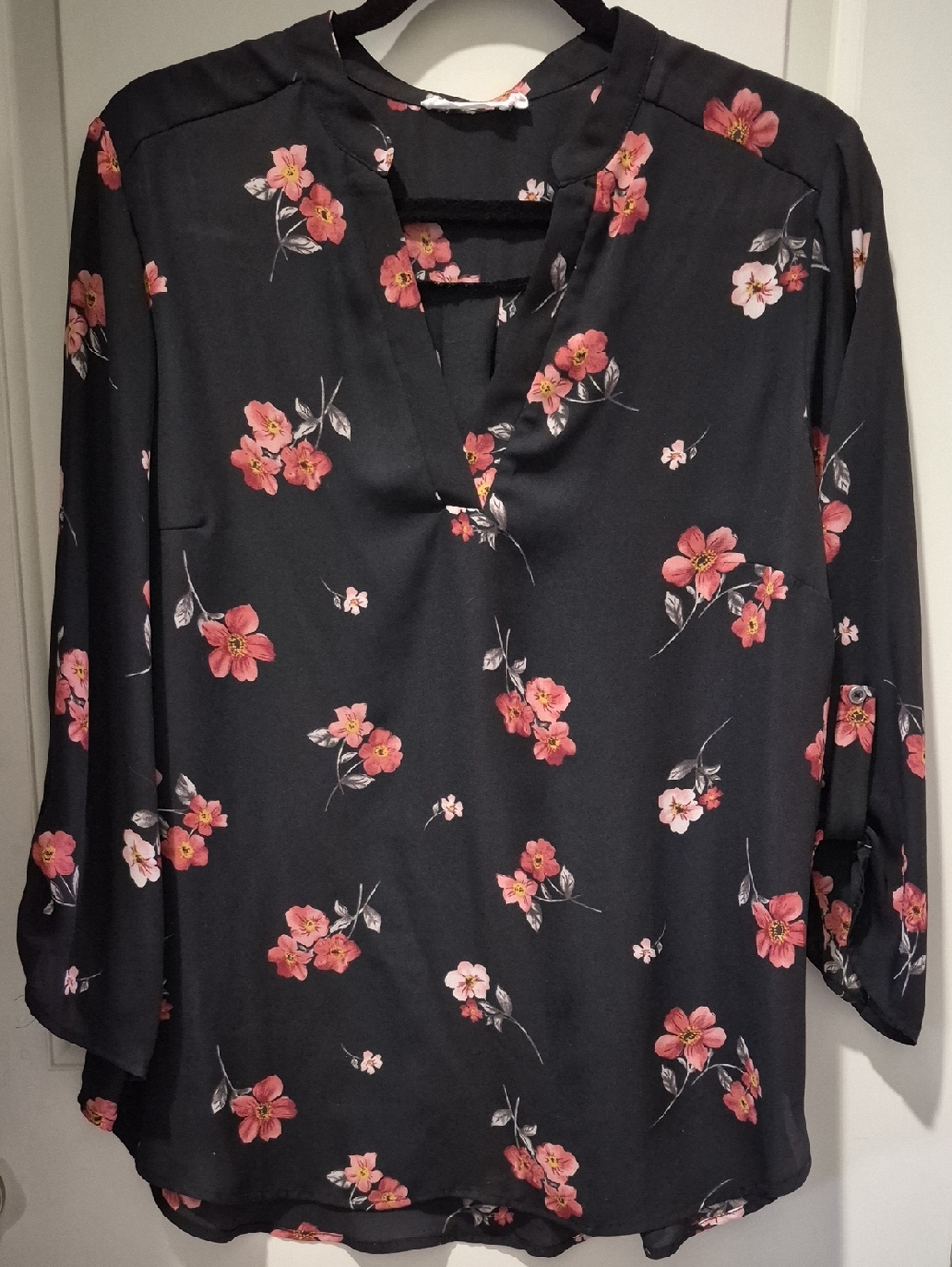 Lush Black Split-Neck Blouse with Pink Floral Print